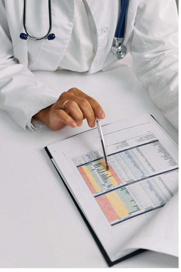 A physician reviewing treatment documentation