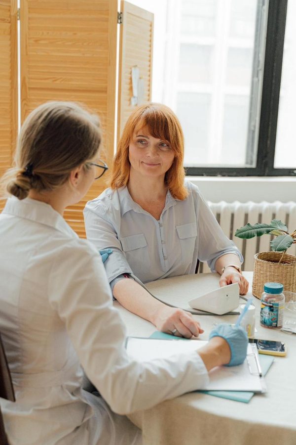 A case manager going through documents with a patient
